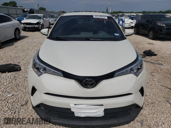 2018 Toyota C-HR XLE with VIN NMTKHMBXXJR041607, listed as a Copart auction lot 60540654 with 84,228 mi miles and Salvage Title. Bid and sale history available at DreamBid. Image 5.