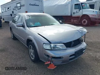 1996 Nissan Maxima GXE z VIN JN1CA21DXTT149299, wystawiony jako IAAI lot #42311065 z przebiegiem 235 943 mil mil oraz . Historia ofert i sprzedaży dostępna na DreamBid. Obrazek 1.