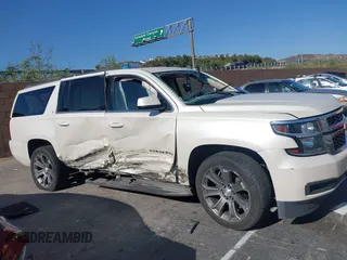 2015 Chevrolet Suburban LT with VIN 1GNSCJKC9FR295169, listed as a IAAI auction lot 42374760 with Not provided miles and . Bid and sale history available at DreamBid. Image 12.