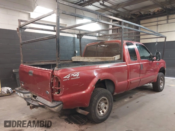 2002 Ford Super Duty F-250 XL with VIN 1FTNX21L82EA87027, listed as a IAAI auction lot 41893004 with 214,580 mi miles. Bid and sale history available at carsss.com. Image 4.