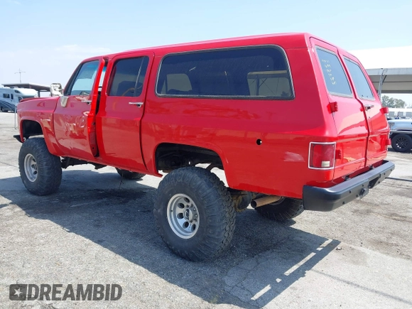 1991 GMC Suburban z VIN 1GKGR26N7MF513031, wystawiony jako IAAI lot #42179575 z przebiegiem 68 871 mil mil oraz . Historia ofert i sprzedaży dostępna na DreamBid. Obrazek 3.