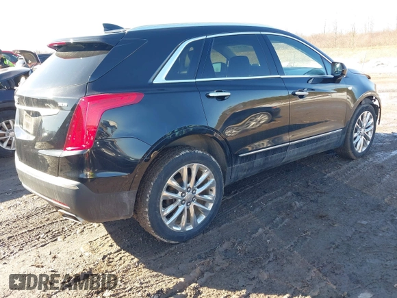 2019 Cadillac XT5 Premium Luxury AWD z VIN 1GYKNFRS1KZ250468, wystawiony jako IAAI lot #41764152 z przebiegiem 107 918 mil mil oraz . Historia ofert i sprzedaży dostępna na DreamBid. Obrazek 4.