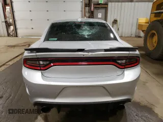 2021 Dodge Charger R/T with VIN 2C3CDXCT5MH522015, listed as a Copart auction lot 61149265 with 77,323 mi miles and Salvage title. Bid and sale history available at DreamBid. Image 6.