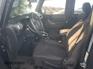 2018 Jeep Wrangler JK Unlimited Sport S with VIN 1C4BJWDG0JL811667, listed as a Copart auction lot 63179784 with 81,860 mi miles and Salvage Title. Bid and sale history available at carsss.com. Image 7.