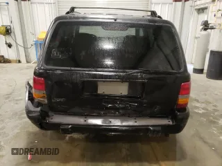 1997 Jeep Grand Cherokee Laredo с VIN 1J4GZ58S3VC508180, выставлен на аукционе Copart как лот 54856525 с пробегом 214 845 миль миль и На запчасти • Non repairable. История ставок и продаж доступна на DreamBid. Изображение 6.