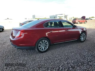 2013 Lincoln MKS z VIN 1LNHL9DK2DG618326, wystawiony jako Copart lot #56875965 z przebiegiem 150 812 mil mil oraz Szkoda całkowita • Salvage title. Historia ofert i sprzedaży dostępna na DreamBid. Obrazek 3.
