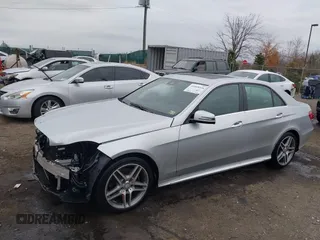 2014 Mercedes-Benz E 350 Luxury with VIN WDDHF8JB0EB075945, listed as a IAAI auction lot 41018546 with 66,678 mi miles and . Bid and sale history available at DreamBid. Image 18.