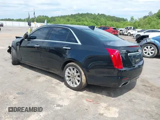 2016 Cadillac CTS AWD with VIN 1G6AW5SX7G0129019, listed as a IAAI auction lot 42148335 with 86,023 mi miles and . Bid and sale history available at DreamBid. Image 3.