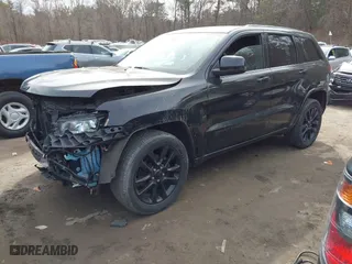 2018 Jeep Grand Cherokee Laredo E with VIN 1C4RJFAG2JC280670, listed as a IAAI auction lot 41686231 with 84,511 mi miles. Bid and sale history available at carsss.com. Image 2.