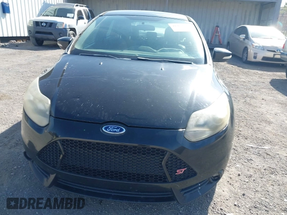 2014 Ford Focus ST with VIN 1FADP3L97EL199309, listed as a IAAI auction lot 41969919 with 174,344 mi miles and . Bid and sale history available at carsss.com. Image 13.