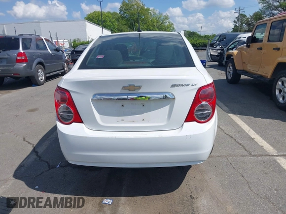 2014 Chevrolet Sonic LT with VIN 1G1JC5SH0E4232070, listed as a IAAI auction lot 41970353 with 140,557 mi miles and . Bid and sale history available at DreamBid. Image 16.