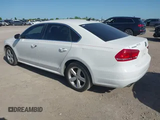 2015 Volkswagen Passat 1.8T Limited Edition with VIN 1VWAT7A34FC085880, listed as a IAAI auction lot 42007677 with 184,722 mi miles. Bid and sale history available at carsss.com. Image 3.