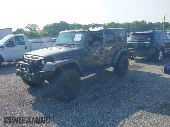 2016 Jeep Wrangler Unlimited Sport with VIN 1C4BJWDG9GL211030, listed as a IAAI auction lot 42459945 with 61,671 mi miles and . Bid and sale history available at DreamBid. Image 2.