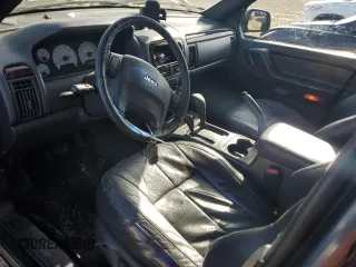 2001 Jeep Grand Cherokee Limited with VIN 1J4GW58N21C591520, listed as a Copart auction lot 42445475 with 247,858 mi miles and Salvage Title. Bid and sale history available at DreamBid. Image 8.
