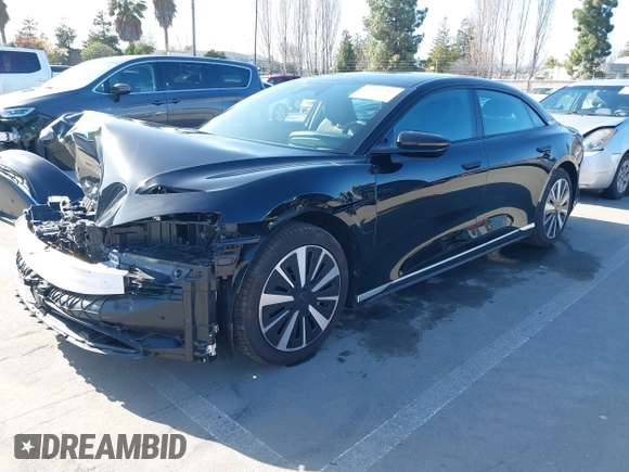 2024 Lucid Air Pure z VIN 50EA1PGA8RA003420, wystawiony jako IAAI lot #41593215 z przebiegiem 3856 mil mil oraz . Historia ofert i sprzedaży dostępna na DreamBid. Obrazek 21.