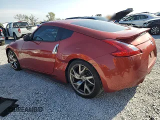 2013 Nissan 370Z with VIN JN1AZ4EH5DM382852, listed as a Copart auction lot 51109385 with 106,940 mi miles and Salvage Title. Bid and sale history available at carsss.com. Image 2.