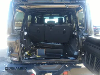 2023 Jeep Wrangler Sahara with VIN 1C4HJXEN9PW624996, listed as a IAAI auction lot 41132256 with 20,980 mi miles. Bid and sale history available at carsss.com. Image 8.