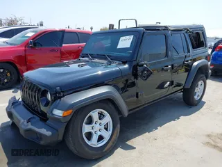 2023 Jeep Wrangler Willys with VIN 1C4HJXDG5PW615358, listed as a IAAI auction lot 42383749 with 31,988 mi miles and . Bid and sale history available at DreamBid. Image 18.