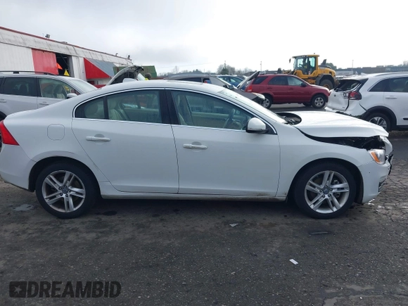 2015 Volvo S60 T5 Drive-E Premier with VIN YV126MFK4F2349564, listed as a IAAI auction lot 41711836 with 59,897 mi miles. Bid and sale history available at carsss.com. Image 13.