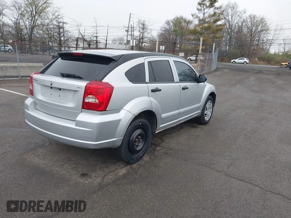 2007 Dodge Caliber SXT with VIN 1B3HB48BX7D379555, listed as a IAAI auction lot 42022554 with 99,670 mi miles and . Bid and sale history available at DreamBid. Image 4.
