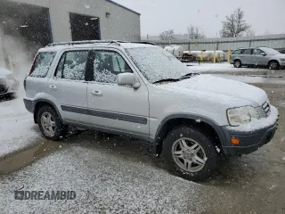 1999 Honda CR-V EX with VIN JHLRD1764XC084847, listed as a Copart auction lot 44084255 with 203,271 mi miles and Clean Title. Bid and sale history available at carsss.com. Image 4.