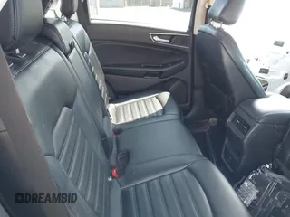 2020 Ford Edge SEL z VIN 2FMPK4J95LBA31157, wystawiony jako IAAI lot #42225863 z przebiegiem 96 082 mil mil oraz . Historia ofert i sprzedaży dostępna na DreamBid. Obrazek 8.
