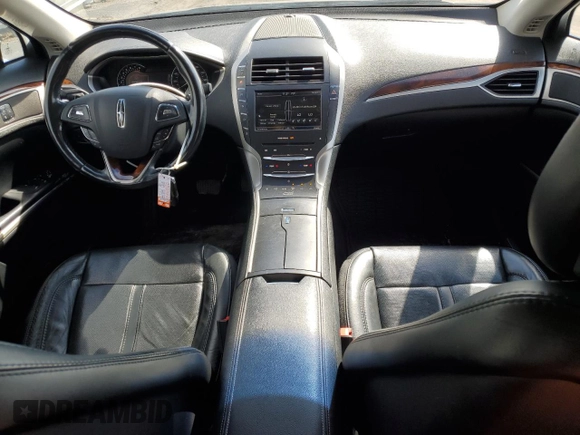 2015 Lincoln MKZ z VIN 3LN6L2JKXFR600669, wystawiony jako Copart lot #51130115 z przebiegiem 75 176 mil mil oraz Szkoda całkowita • Salvage title. Historia ofert i sprzedaży dostępna na DreamBid. Obrazek 8.