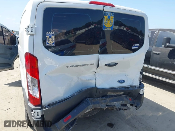 2018 Ford Transit with VIN 1FTYE1ZM0JKA43498, listed as a IAAI auction lot 42514847 with 131,539 mi miles and . Bid and sale history available at DreamBid. Image 6.