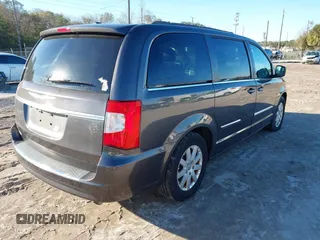 2016 Chrysler Town & Country Touring with VIN 2C4RC1BG6GR245495, listed as a IAAI auction lot 41410233 with 143,348 mi miles and . Bid and sale history available at DreamBid. Image 4.
