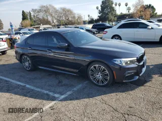 2018 BMW 5 Series 530i with VIN WBAJA5C59JWA36905, listed as a Copart auction lot 42958585 with 54,290 mi miles and Salvage Title. Bid and sale history available at DreamBid. Image 4.