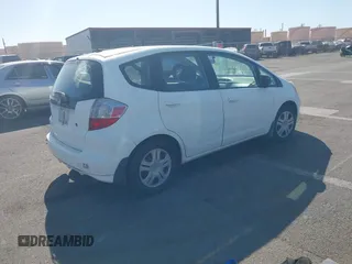 2010 Honda Fit with VIN JHMGE8H25AC029528, listed as a IAAI auction lot 41084208 with 58,774 mi miles. Bid and sale history available at carsss.com. Image 4.