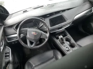 2019 Cadillac XT4 AWD Premium Luxury с VIN 1GYFZDR4XKF117964, выставлен на аукционе Copart как лот 52339265 с пробегом 99 840 миль миль и Списание • Salvage title. История ставок и продаж доступна на DreamBid. Изображение 8.