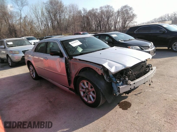 2007 Chrysler 300 Touring with VIN 2C3LA53G57H785979, listed as a IAAI auction lot 36241614 with 220,841 mi miles. Bid and sale history available at carsss.com. Image 1.
