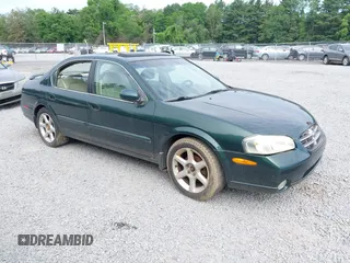 2001 Nissan Maxima GXE with VIN JN1CA31D91T615792, listed as a IAAI auction lot 42521675 with 94,495 mi miles and . Bid and sale history available at DreamBid. Image 1.