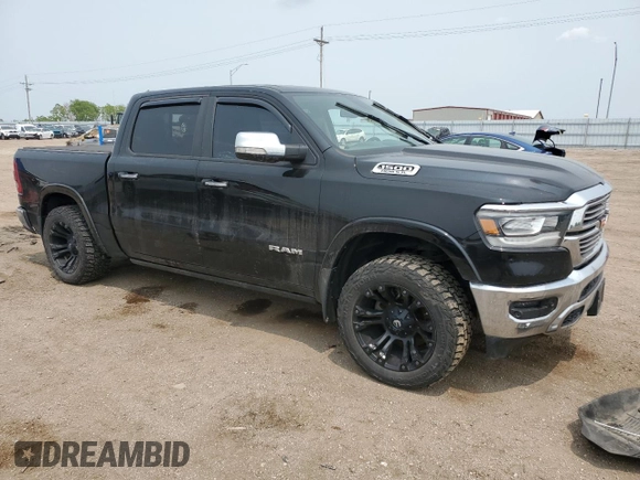 2019 Ram 1500 Laramie with VIN 1C6SRFJTXKN714855, listed as a Copart auction lot 58765625 with Not provided miles and Salvage title. Bid and sale history available at DreamBid. Image 4.