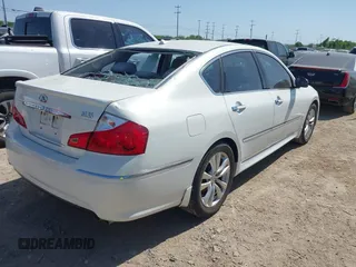 2010 Infiniti M with VIN JN1CY0AP7AM910033, listed as a IAAI auction lot 42012298 with 189,588 mi miles and . Bid and sale history available at carsss.com. Image 4.