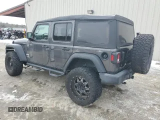 2019 Jeep Wrangler Unlimited Sport with VIN 1C4HJXDG0KW540190, listed as a Copart auction lot 42140675 with 66,470 mi miles and Salvage title. Bid and sale history available at DreamBid. Image 2.