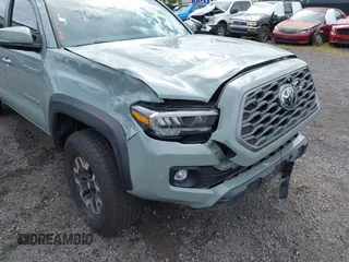 2023 Toyota Tacoma SR5 z VIN 3TYDZ5BNXPT024914, wystawiony jako IAAI lot #41302756 z przebiegiem 20 307 mil mil oraz . Historia ofert i sprzedaży dostępna na DreamBid. Obrazek 6.