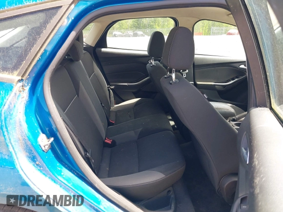 2012 Ford Focus SE z VIN 1FAHP3K29CL230126, wystawiony jako IAAI lot #42306310 z przebiegiem 143 981 mil mil oraz . Historia ofert i sprzedaży dostępna na DreamBid. Obrazek 8.