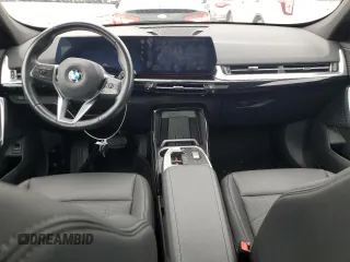 2023 BMW X1 xDrive28i with VIN WBX73EF09P5W64467, listed as a Copart auction lot 58586875 with 29,022 mi miles and Salvage title. Bid and sale history available at DreamBid. Image 8.