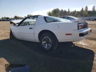 1988 Pontiac Firebird z VIN 1G2FS21S4JL245615, wystawiony jako Copart lot #73486314 z przebiegiem 144 774 mil mil oraz Czysty tytuł • Clean title. Historia ofert i sprzedaży dostępna na DreamBid. Obrazek 2.