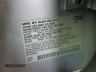 2018 Audi Q7 Premium Plus z VIN WA1LAAF71JD045991, wystawiony jako Copart lot #61437075 z przebiegiem 33 702 mil mil oraz Szkoda całkowita • Salvage title. Historia ofert i sprzedaży dostępna na DreamBid. Obrazek 13.