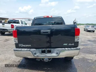 2013 Toyota Tundra with VIN 5TFDW5F12DX305493, listed as a IAAI auction lot 42265066 with 192,462 mi miles and . Bid and sale history available at DreamBid. Image 16.