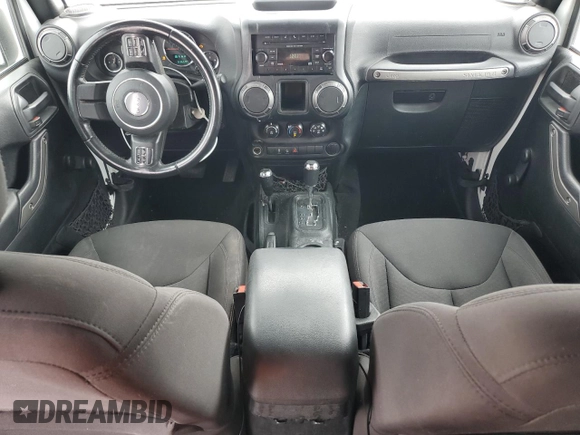 2018 Jeep Wrangler Unlimited Sport with VIN 1C4BJWDG8JL883524, listed as a Copart auction lot 52830295 with 63,659 mi miles and Salvage Title. Bid and sale history available at DreamBid. Image 8.