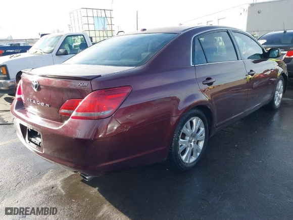 2009 Toyota Avalon XL with VIN 4T1BK36B69U348321, listed as a IAAI auction lot 41478085 with 182,541 mi miles. Bid and sale history available at carsss.com. Image 4.