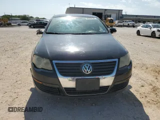 2007 Volkswagen Passat with VIN WVWJK73CX7P065789, listed as a Copart auction lot 56332135 with 137,400 mi miles and Salvage title. Bid and sale history available at DreamBid. Image 5.