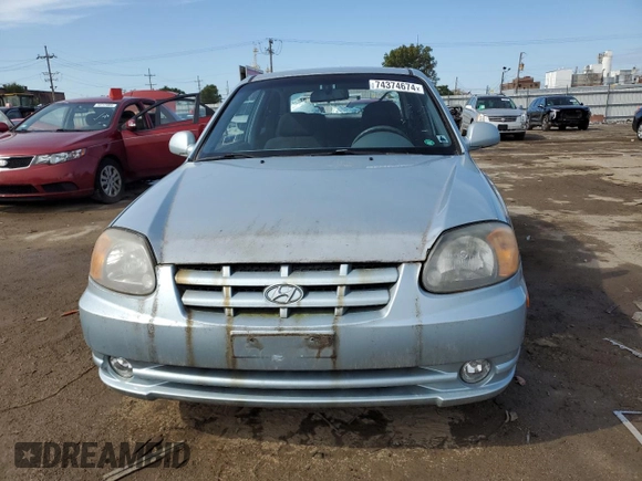2005 Hyundai Accent GLS with VIN KMHCG35CX5U335873, listed as a Copart auction lot 74374674 with 91,381 mi miles and Clean Title. Bid and sale history available at carsss.com. Image 5.
