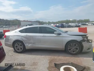 2014 Chevrolet Impala LT with VIN 2G1125S39E9313542, listed as a IAAI auction lot 41988420 with 227,093 mi miles and . Bid and sale history available at DreamBid. Image 13.
