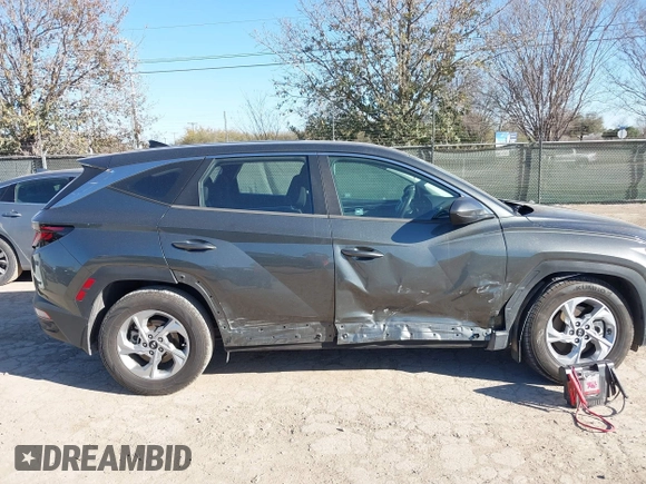 2022 Hyundai Tucson SE with VIN 5NMJA3AE4NH024581, listed as a IAAI auction lot 41725035 with 49,696 mi miles and . Bid and sale history available at carsss.com. Image 13.