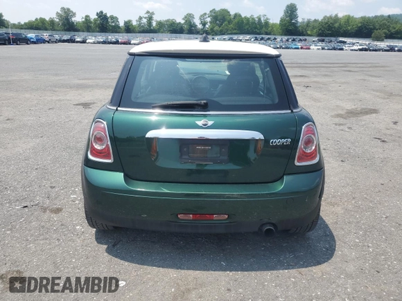 2011 MINI Hardtop with VIN WMWSU3C51BTX95581, listed as a Copart auction lot 60443995 with 157,213 mi miles and Salvage title. Bid and sale history available at DreamBid. Image 6.